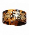 Tortoise style bangle with carved design. - CH185R58H6U